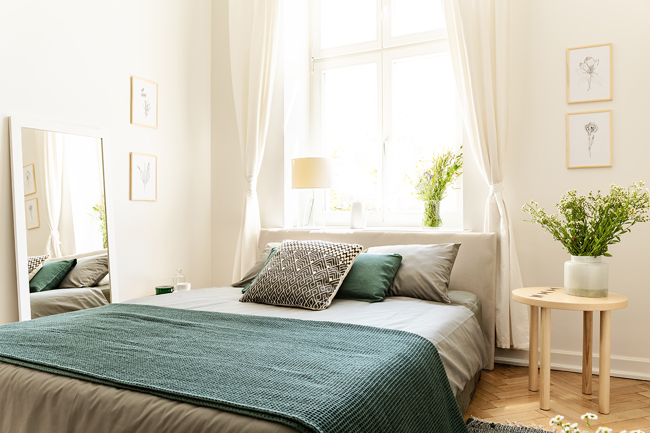 Eco-cotton-linen-and-blanket-on-a-bed-in-nature-loving-family-guesthouse-for-spring-and-summer-vacation